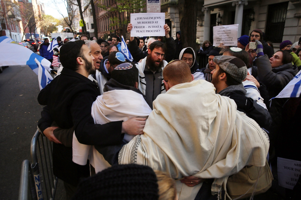 Pro-Israel protestors demonstrate in front of the Permanent Observer Mission of the State of Palestine to the United Nations following the murder in Jerusalem of four men by two armed Palestinians; November 18, 2014 in New York City. (Photo by Spencer Platt/Getty Images)